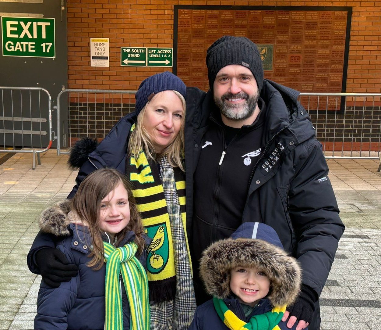 Andy Wall and his family returning to Carrow Rd after his cardiac arrest.