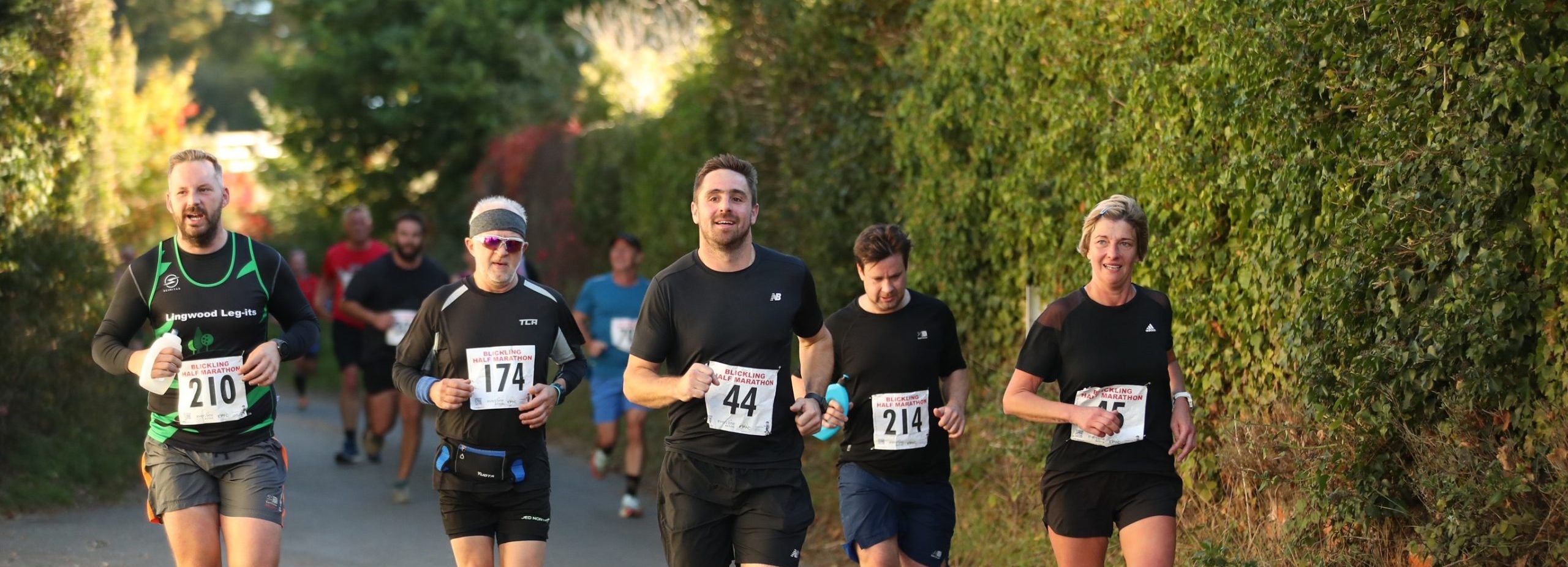 Group of runners running Blickling Half Marathon