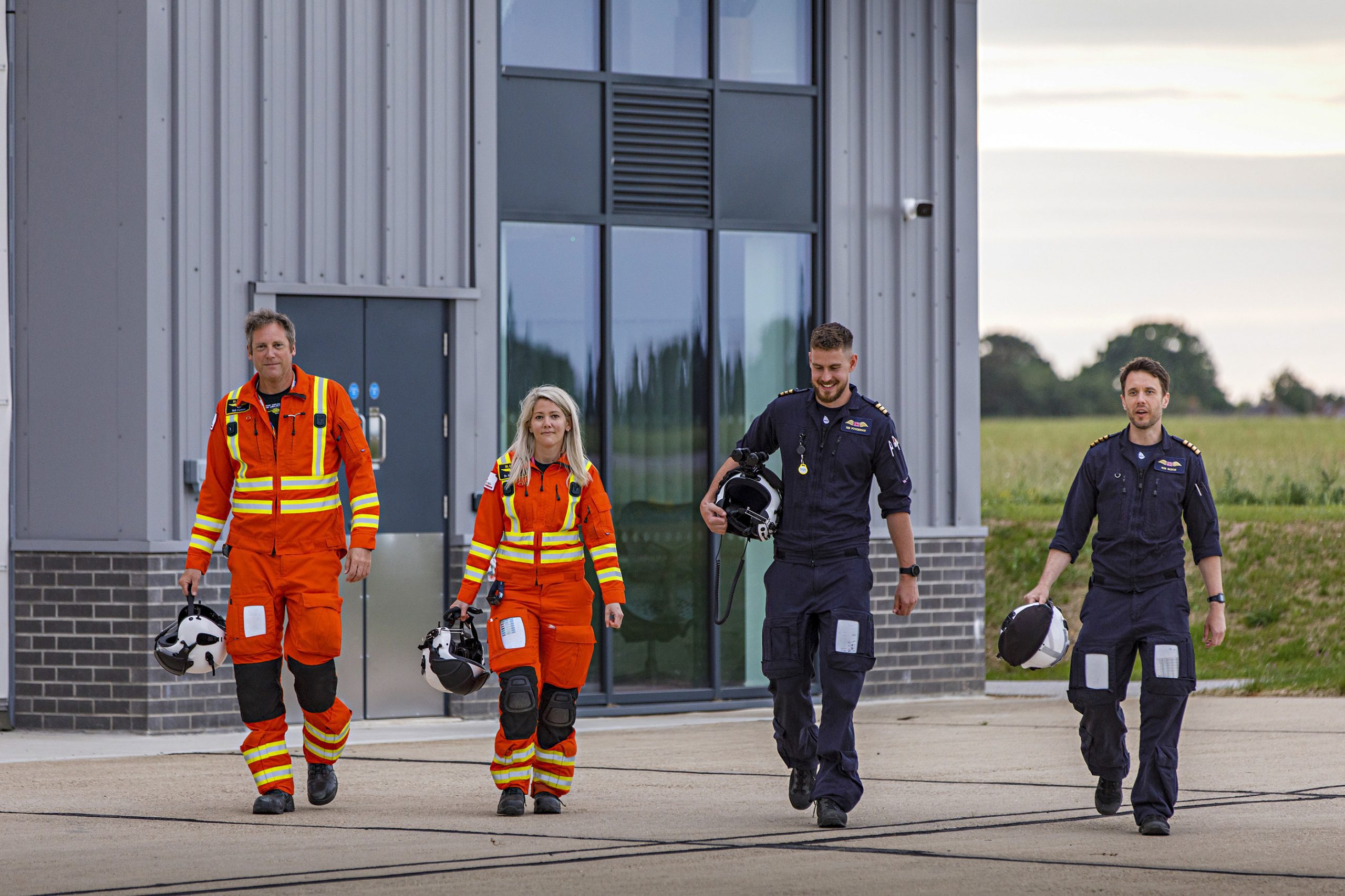 crew walking on helipad at helimed house