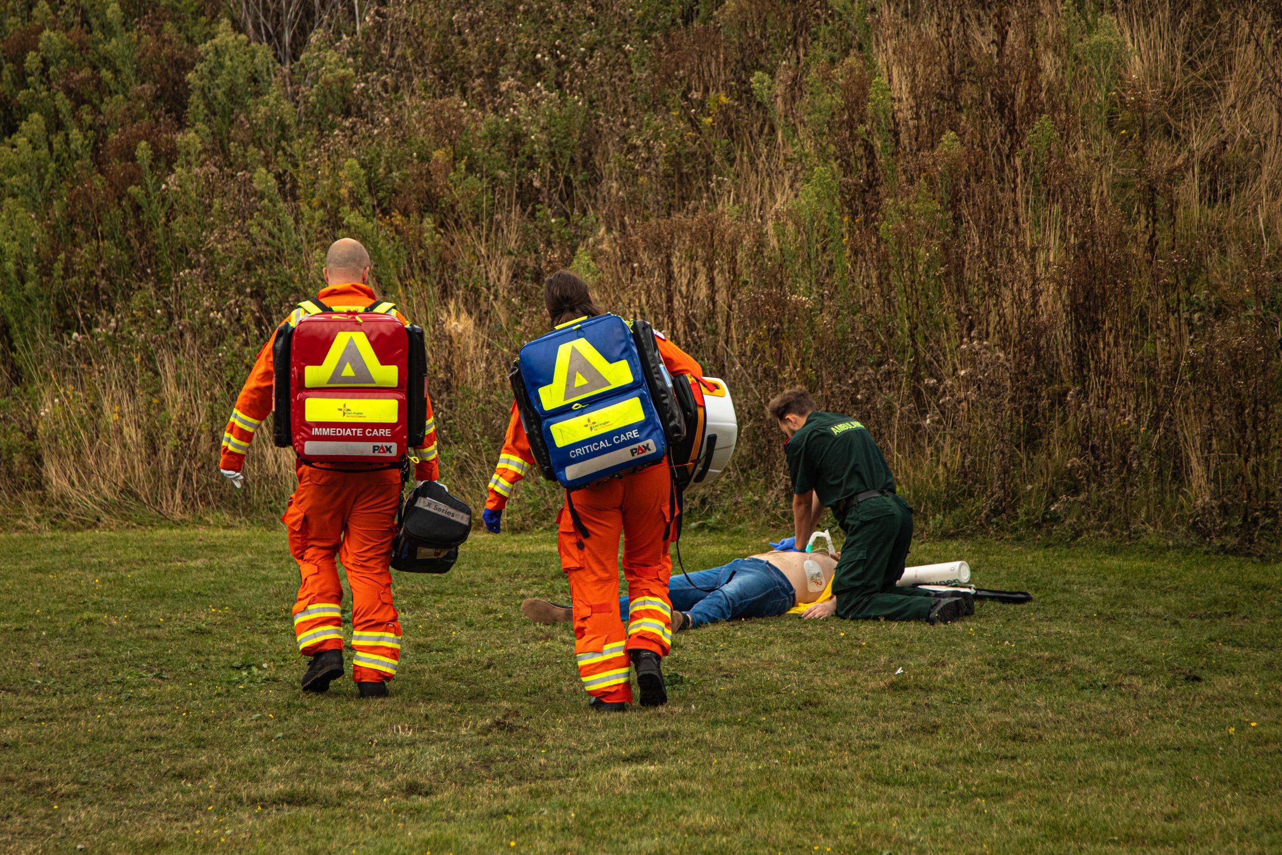 Crew walking towards patient