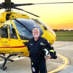 Pilot Dave in front of Helicopter
